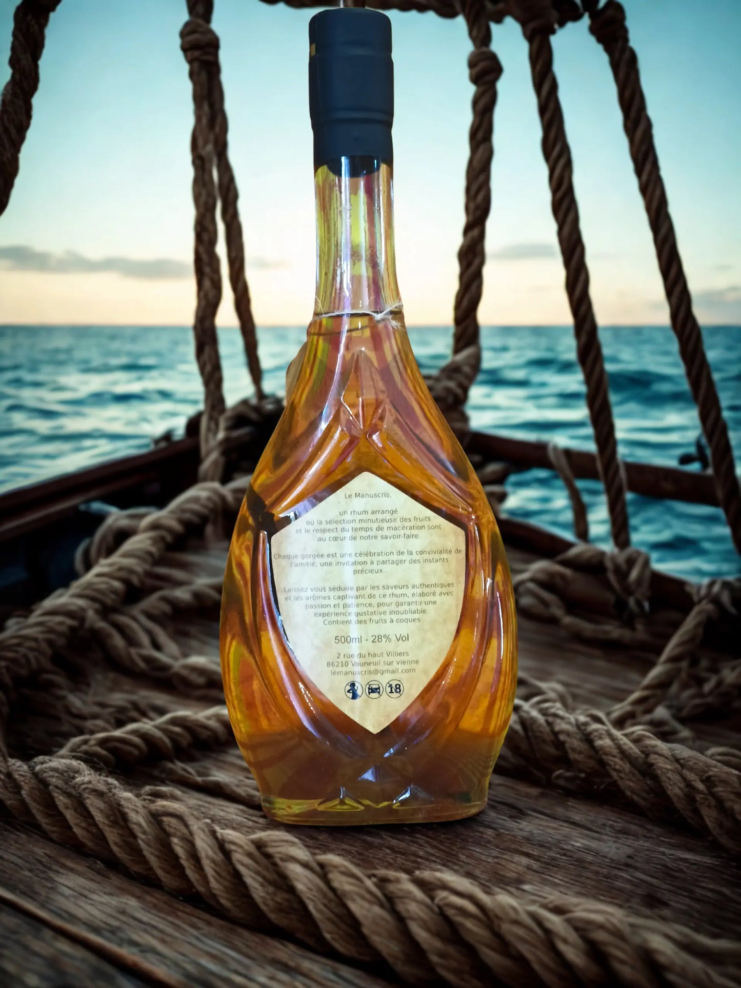 bouteille  Le Manuscris – Rhum arrangé artisanal  Poire, Pomme, Cannelle & Vanille - 500 ml - 28% vol.